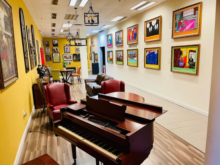 An extension of our lobby that joins our concession area. A great place to relax and browse our exclusive "Yo Mama" art gallery!